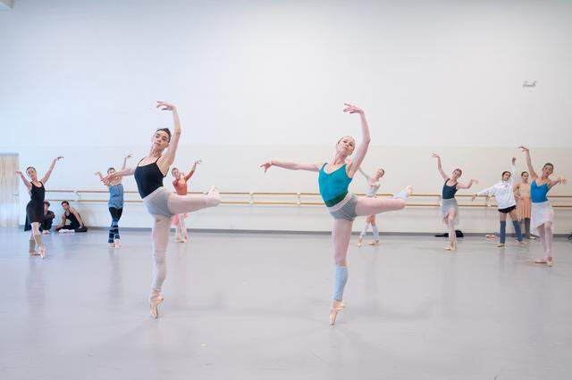 Adrienne Carter and Nicole Stalker doubling the grandness of a balanced pose in “Diamonds” from Jewels. Choreography by George Balanchine.